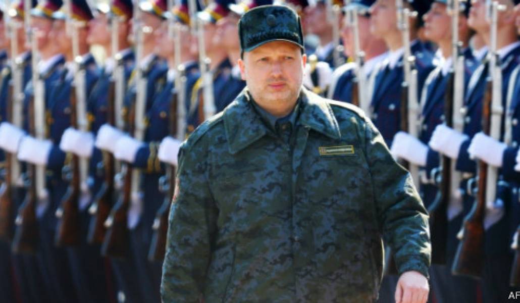 140410100216_turchinov_marching_512x288_afp