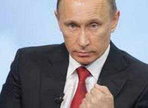 Vladimir Putin signs law to ease Russian citizenship for migrants