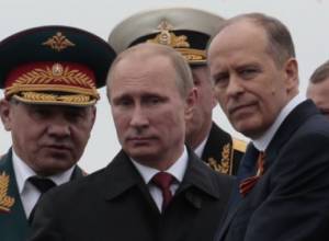 Putin orders Russian troops back to bases, but no sign of withdrawal yet