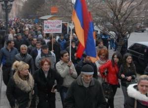 Ralliers march to police headquarters