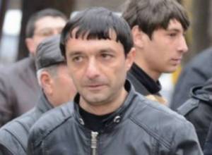 Man stabbing opposition activist surrenders to police