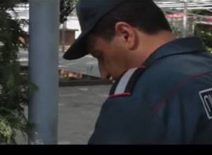 Leaflets are being distributed here: policeman is reporting on leaflets