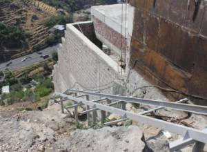 Freight elevator falls into gorge injuring two