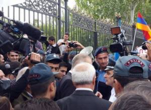 Demonstrators, police officers clash near National Assembly; one person detained