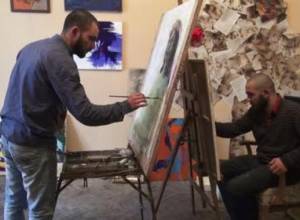 Young artists work in rundown and unsafe building