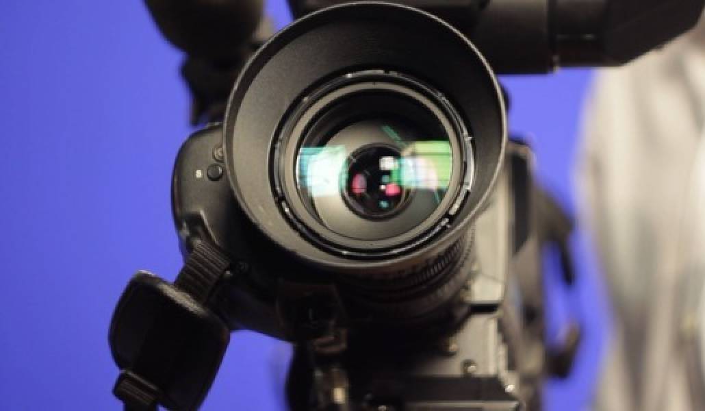 TV.Studio.Camera.Pan_.with_.Operator