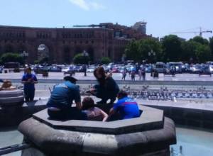 Rescuers managed to get the woman out of Republic Square fountains