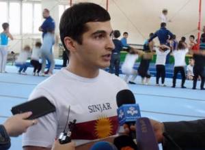 Yazidi athlete breaks Guinness world record for most handstand push ups