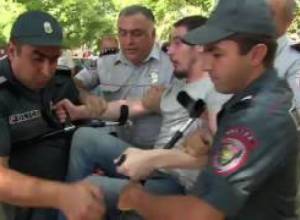 "They are putting handcuffs on me, but I do not know why"