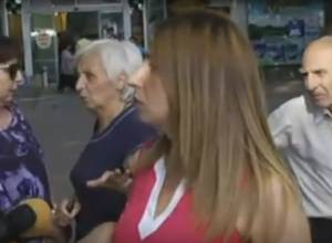 Zaruhi Postanjyan tries to pass food to gunmen in seized police station