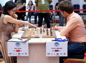 Левон Аронян вывел из борьбы Ху Йифан