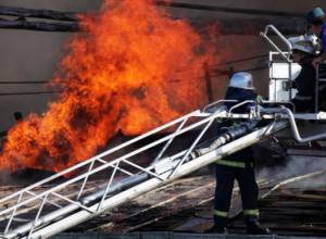 Roofs engulfed in flames