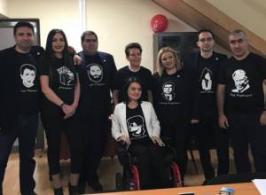 Members of Yelk wearing special shirts