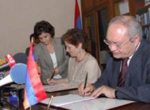 U.S. Ambassador and RA Prosecutor General sign agreement