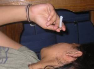 What happens when one sleeps with lit cigarette?