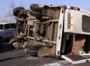 Minibus turns over, 2 injured