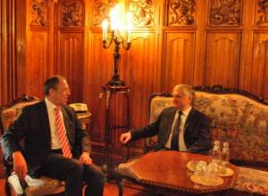 Ministers exchange documents