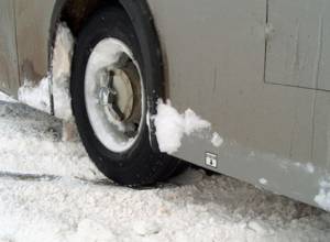 Bus with 60 passengers gets stuck in snow