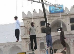 Four hanged in public