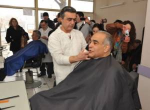 Raffi Hovannisian has his hair cut at casual barber's