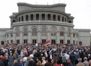 Hand raised against Armen Martisrosyan's mother