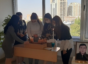 Candlelight vigil in memory of classmate