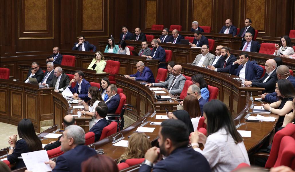 աժ
